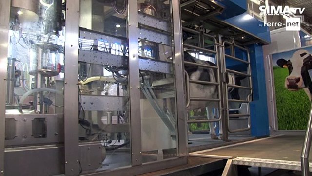 Le bras du MR-D1 trait plus d’une centaine de vaches par l’arrière