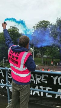 Extinction Rebellion activists hold rooftop protest