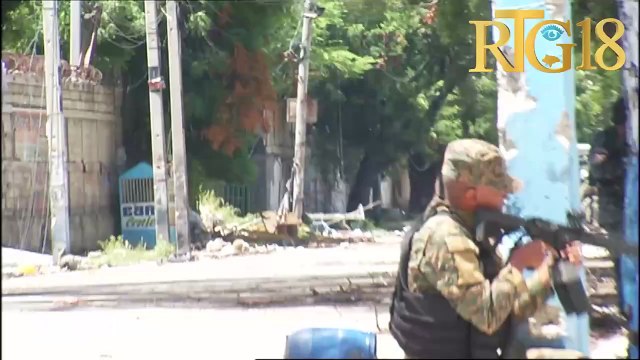 Polisye nan plizyè inite nan PNH la deplwaye nan ri St-Honoré Pòtoprens jounen madi 9 Jiyè 2024 la.