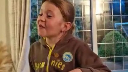 Middle child's heart flooded with delight after parents tell her about baby #4