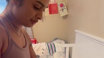 Chaotic moment as an aunt tries to put pants on a fussy newborn baby