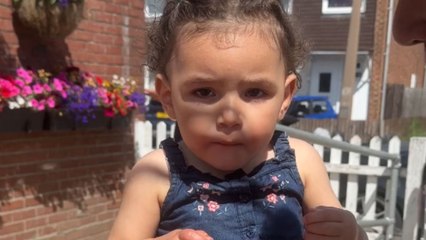 Toddler doesn't want to obey the no-eating instructions about her hamburger