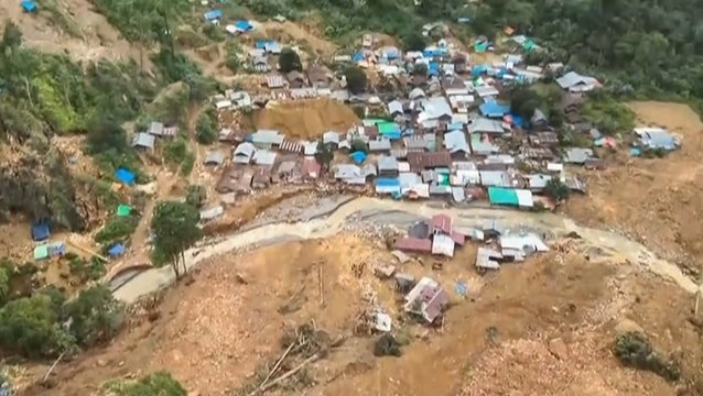 Search intensifies for dozens buried in Indonesian landslide that killed at least 23