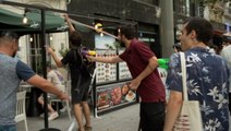 Protestors Spray Tourists with Water Guns During Demonstration Against Overtourism in Barcelona