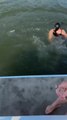 Woman Falls into Water While Playing Drinking Game