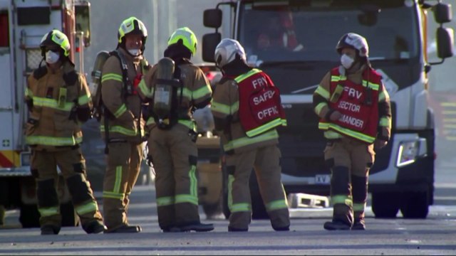 Fire crew still at site of factory fire in Melbourne yesterday
