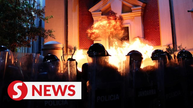Albanian anti-government protesters hurl petrol bombs and scuffle with police