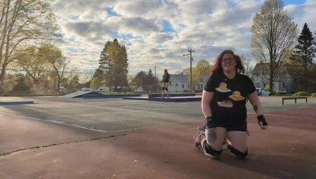 Woman on Roller Skates Falls Down and Performs Perfect Tuck and Roll