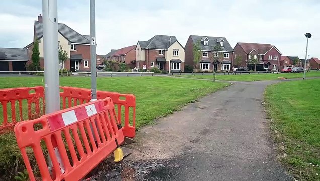 New build housing estate in Shrewsbury where developers have not even finished off roads and paths.