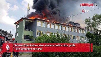 Okulun çatısı alevlere teslim oldu, Türk polisi bayrağı böyle kurtardı