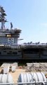 Exploring the Marvels of an Aircraft Carrier- How Does it Operate on a Turquoise Lake-