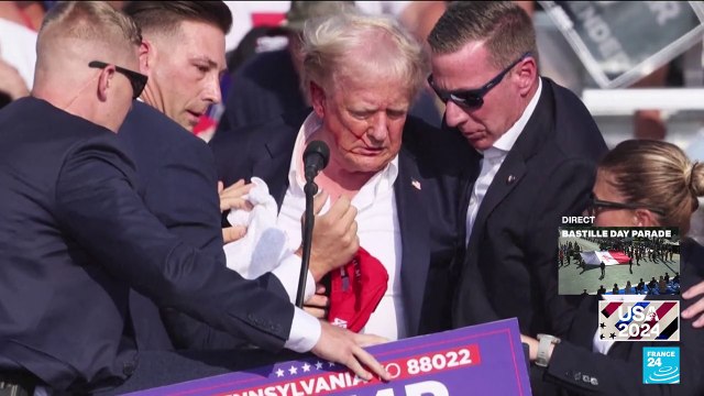 Trump shot in ear at campaign rally in assassination attempt