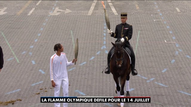 Un 14 juillet aux couleurs des JO : La flamme olympique défile