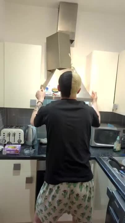 Man Rips Kitchen Hood off Wall While Dancing in Kitchen