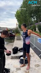 French minister dives into the Seine River to prove it's clean enough to swim