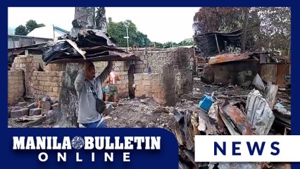 Residents looks for salvageable items from fire in Davao City