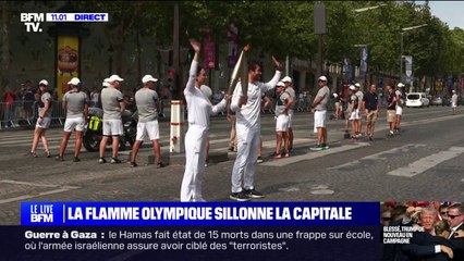 Paris 2024: la flamme olympique est arrivée sur les Champs-Élysées