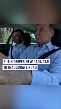 Putin drives new Lada car to inaugurate latest part of Moscow - St. Petersburg toll road