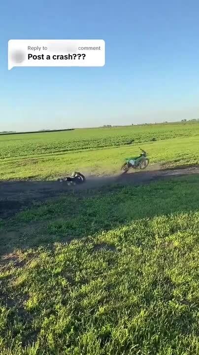 Rider Falls Hard as Dirt Bike Flips Over After Jumping Off Ramp