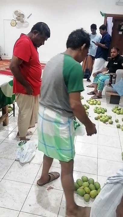 Bangali guy take mango feel happy