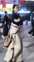 The Tibetan lady is very busy dancing_ and she has to take care of the whole thing.  Tibet(720P_HD)