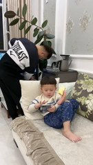 Cute baby can't be hungry. Even if he plays with his phone. .