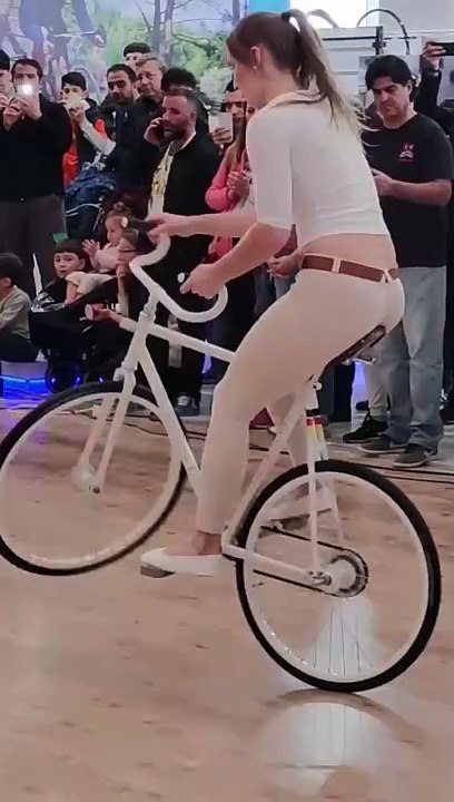 Unbelievable Bicycle Tricks: Talented Girl Shows Off Stunning Skills!