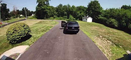 Man Runs After His SUV as it Moves Downhill on its Own