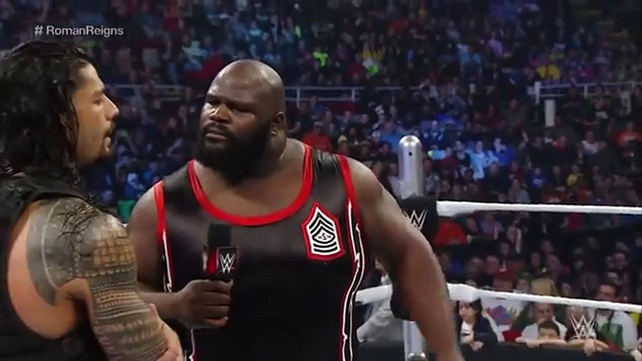 Roman Reigns spears a returning Mark Henry through the barricade_ SmackDown_ March 12_ 2015