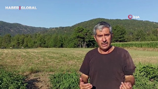 Zorunlu iniş yapan helikopterdeki yangın söndürme ekibini ayranla serinleten köylü kalpleri ısıttı