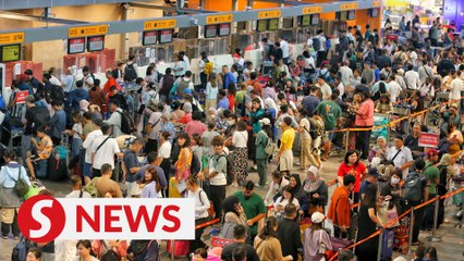 Global IT outage causing long wait for check-in, luggage drop at KLIA2