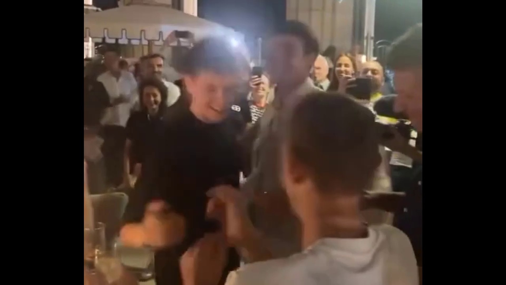 ⁣Cycling - Tour de France 2024 - Tadej Pogacar celebrates his 3rd Tour de France victory in song