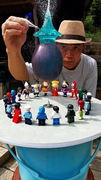 There is water in the balloon and what happened after removing the water with the help of a needle?