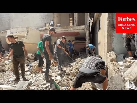 JUST IN: Gazans Deal With Aftermath Of Israeli Airstrike At Nuseirat Refugee Camp