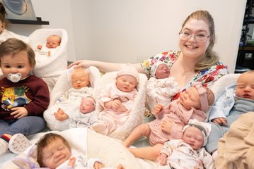 Newlyweds trying for a baby "practice" by changing nappies on 35 reborn dolls