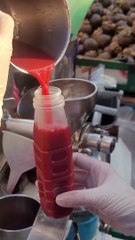 making the famous pomegranate fresh juice