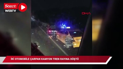 Ankara yolunda iki otomobile çarpan kamyon tren rayına düştü