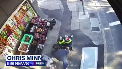 Des images de vidéosurveillance dévoilent les derniers instants d'un père avant qu'il ne tente de sauver une poussette d'un train...