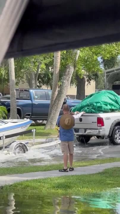 Boat Falls off Trailer While Getting It Out of Water