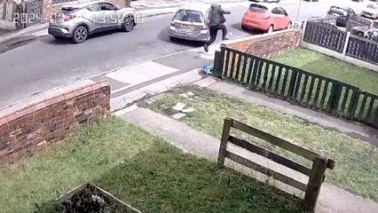 CCTV footage of reckless driver damaging property during heated altercation