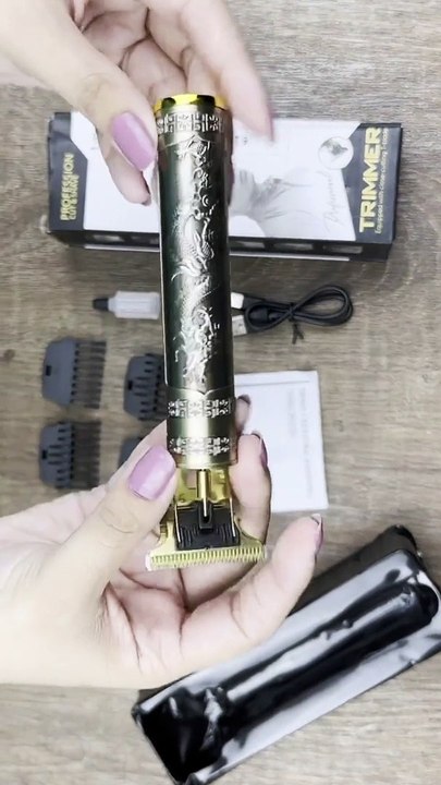 •  Material: ABS Alloy •  Model: KM-2198 •  Product Features: Sharp Blades And Cutting, Fast Charging, Strong Driving Force Zero Oil Head Design, 4 Attachment Guard, Charging Cable •  Voltage/Watts: 220V/5000W •  Weight/Size: 50g •  Charging Time: 2 Hours