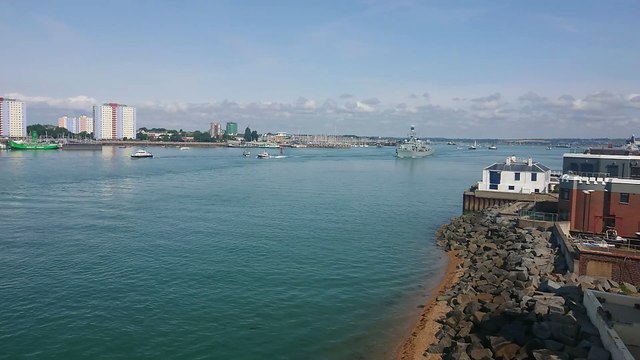 Royal Navy warship HMS Richmond sailing past Portsmouth after brief visit