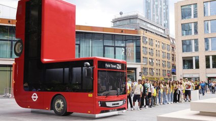 Commuters spot a full-size London bus – which had been folded in half