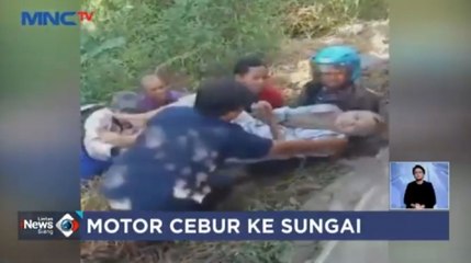 Warga Evakuasi Pemotor Jatuh ke Sungai di Bangkalan