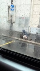 Man and women coming out of sewer in Paris