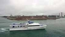 Two Wightlink ferries passing each other in Portsmouth