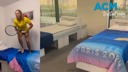 Olympians review the famous cardboard beds