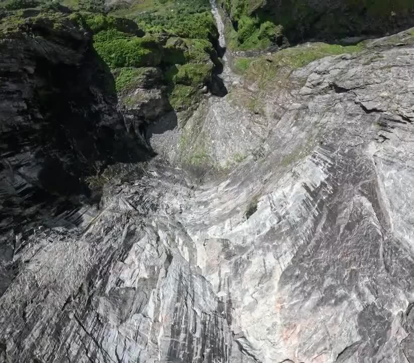 Man Breaks His Foot While Base Jumping Off Cliff