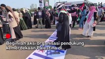 Kecam Genosida terhadap Palestina, Peserta Aksi Injak Bendera Israel