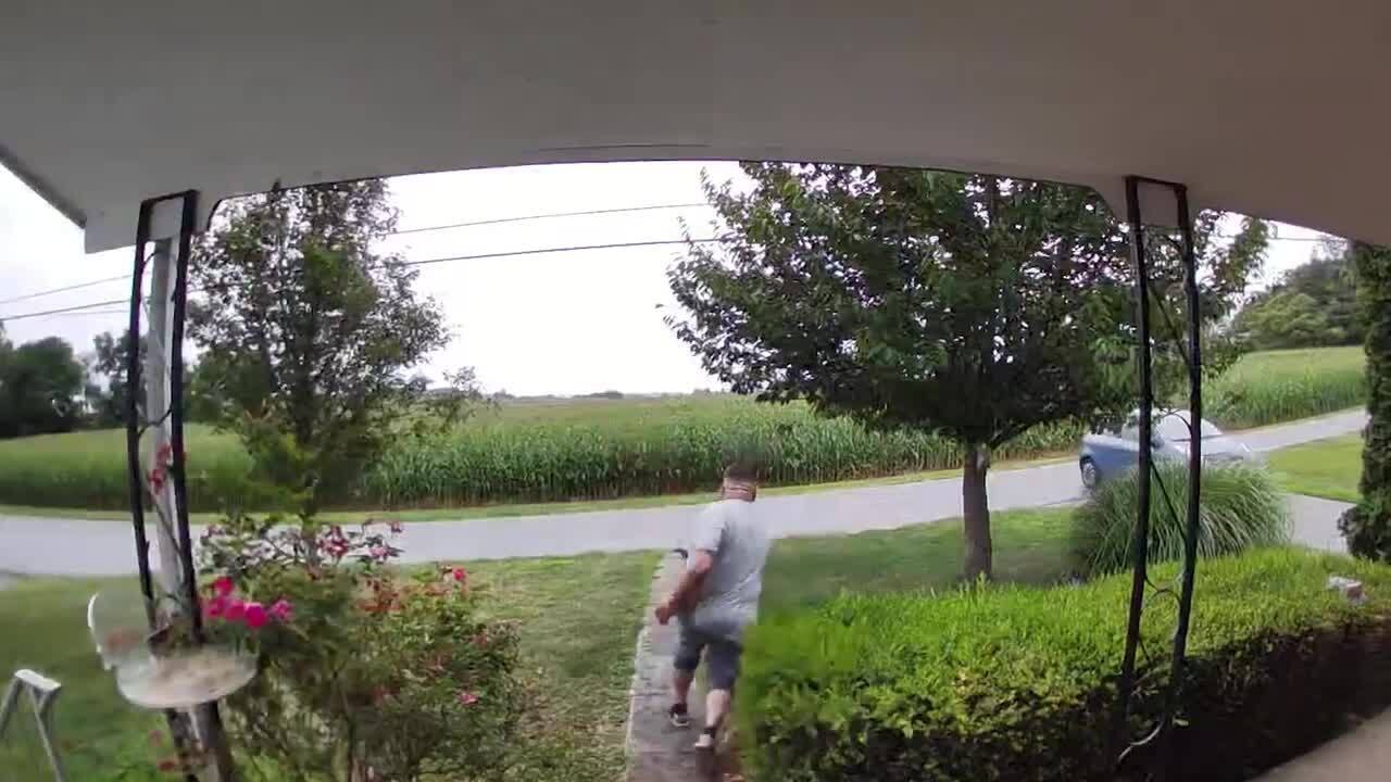 Car Rolls Back into Ditch